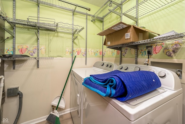 clothes washing area with laundry area and independent washer and dryer