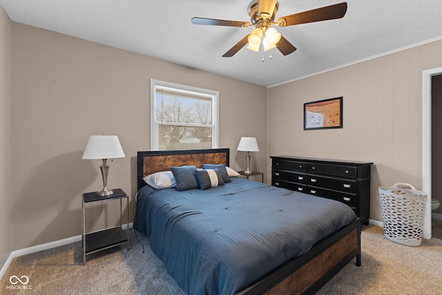 bedroom featuring a ceiling fan, carpet, and baseboards