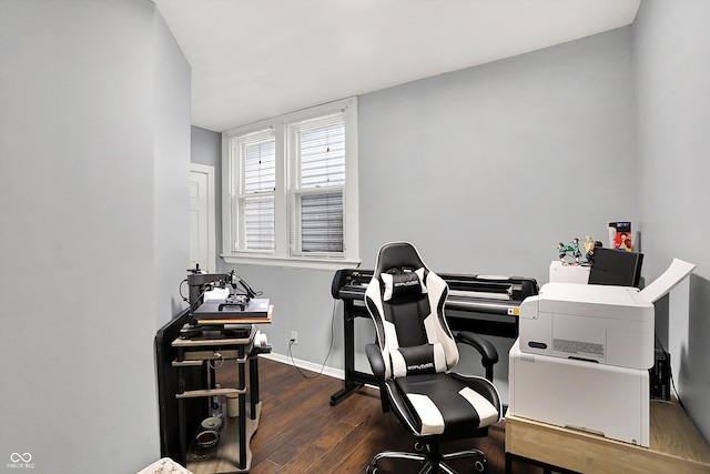 office featuring baseboards and wood finished floors