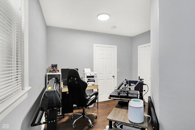 office space with dark wood finished floors