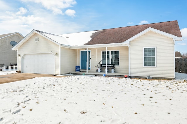 ranch-style house featuring a garage, a porch, and fence