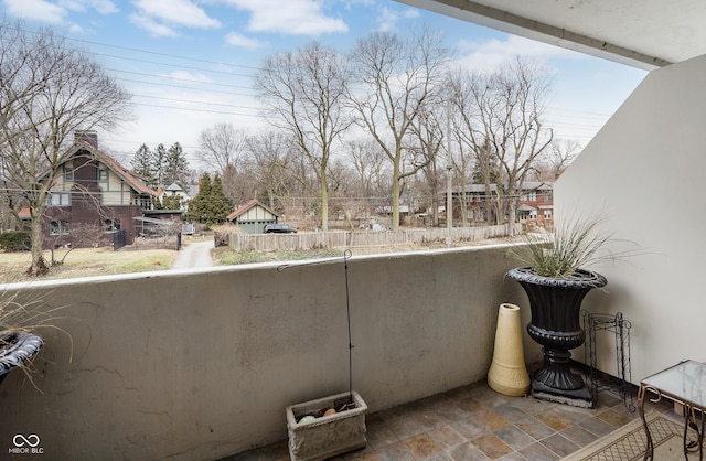 balcony featuring a residential view