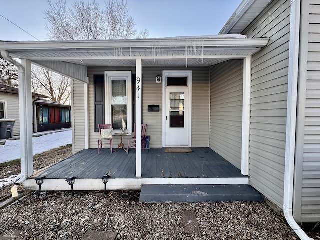 entrance to property with a porch