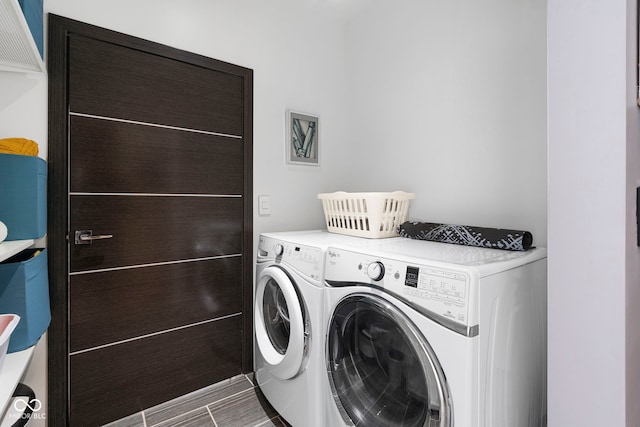 laundry area featuring laundry area and washing machine and clothes dryer