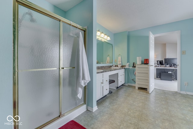 387 Legacy Blvd, Greenwood, IN 46143 - bathroom with vanity, a stall shower, and baseboards