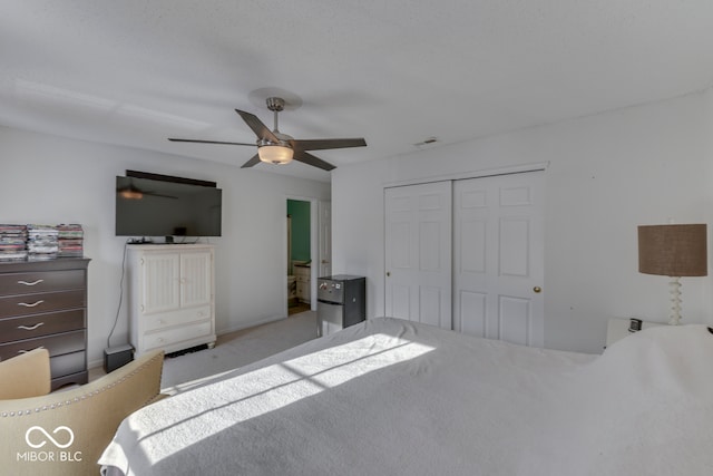 387 Legacy Blvd, Greenwood, IN 46143 - bedroom featuring a closet, carpet, and a ceiling fan