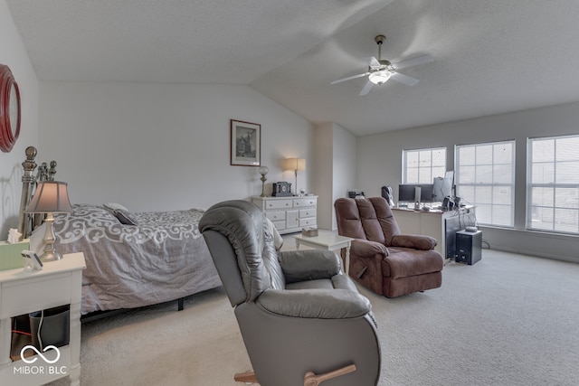 387 Legacy Blvd, Greenwood, IN 46143 - bedroom featuring light carpet, lofted ceiling, a desk, and a ceiling fan