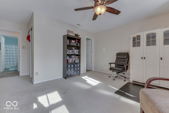 387 Legacy Blvd, Greenwood, IN 46143 - sitting room featuring carpet, ceiling fan, and baseboards