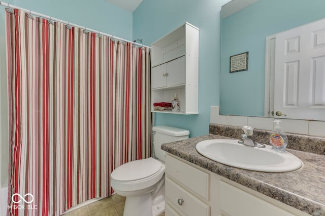 387 Legacy Blvd, Greenwood, IN 46143 - full bath featuring vanity, toilet, a shower with shower curtain, and tile patterned flooring
