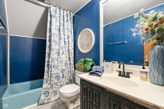 bathroom featuring vanity, shower / tub combo, tile patterned flooring, and toilet