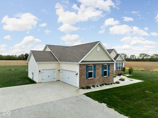 craftsman-style home featuring driveway, brick siding, a front lawn, and an attached garage