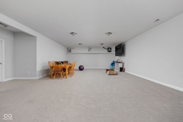 rec room with carpet floors, visible vents, and baseboards