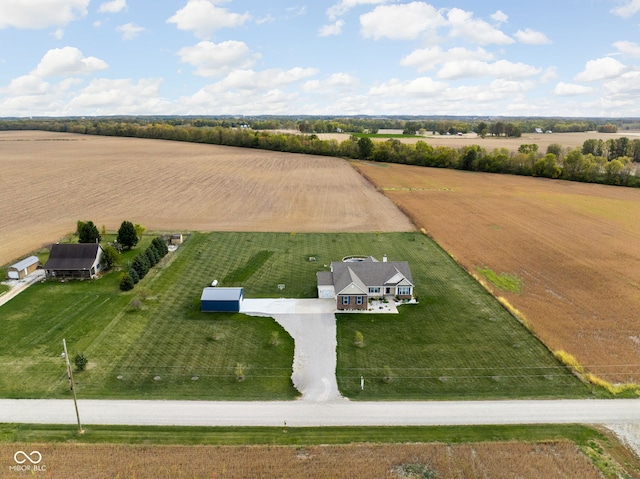 birds eye view of property featuring a rural view