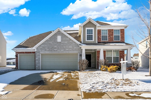 view of front of property with a garage, concrete driveway, brick siding, and a porch