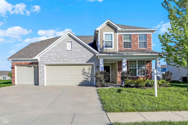 view of front of house with driveway, brick siding, a front lawn, an attached garage, and a shingled roof
