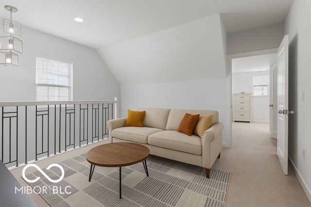 234 N State Ave, Indianapolis, IN 46201 - carpeted living room featuring vaulted ceiling and recessed lighting