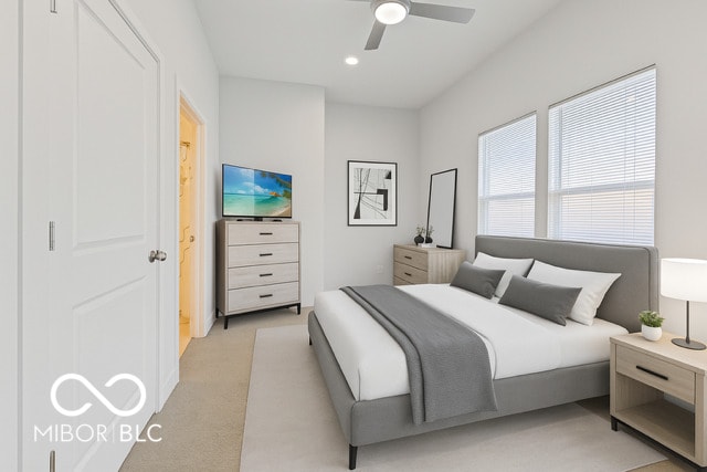 234 N State Ave, Indianapolis, IN 46201 - bedroom with light carpet and ceiling fan