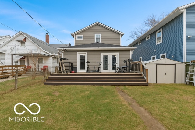 234 N State Ave, Indianapolis, IN 46201 - back of house featuring french doors, a fenced backyard, a storage unit, and a wooden deck