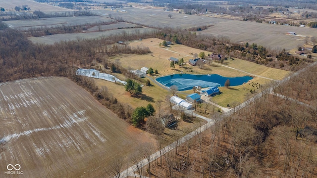 drone / aerial view featuring a water view and a rural view