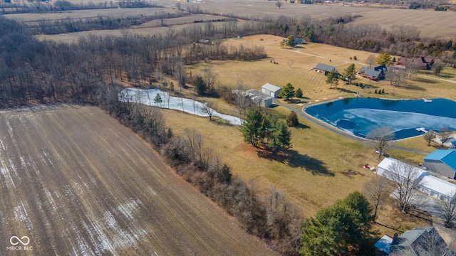 bird's eye view featuring a water view and a rural view