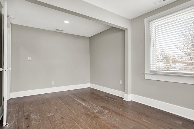 5053 E Michigan St, Indianapolis, IN 46201 - unfurnished room featuring dark wood finished floors, baseboards, and recessed lighting