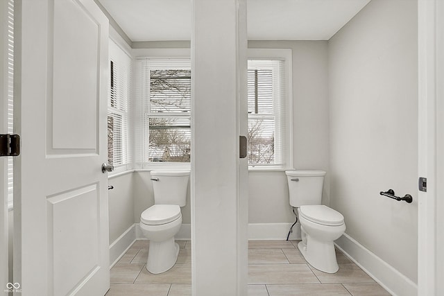 5053 E Michigan St, Indianapolis, IN 46201 - bathroom with toilet and baseboards