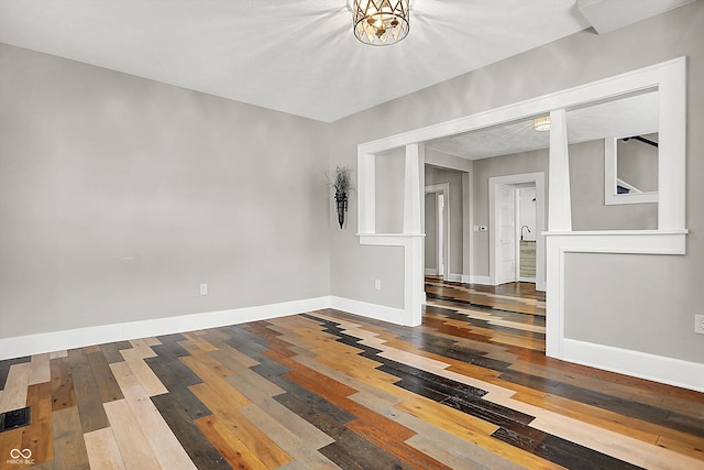 5053 E Michigan St, Indianapolis, IN 46201 - spare room featuring hardwood / wood-style floors and baseboards