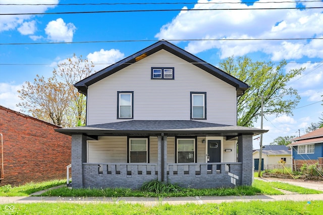 5053 E Michigan St, Indianapolis, IN 46201 - traditional style home with a porch and fence
