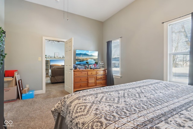 bedroom with carpet flooring and baseboards