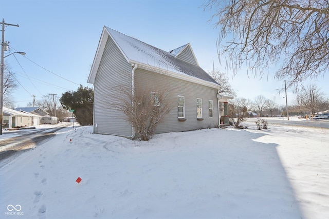 view of snow covered property