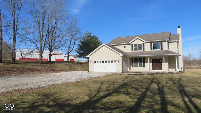 traditional home with dirt driveway, covered porch, a garage, and a front yard