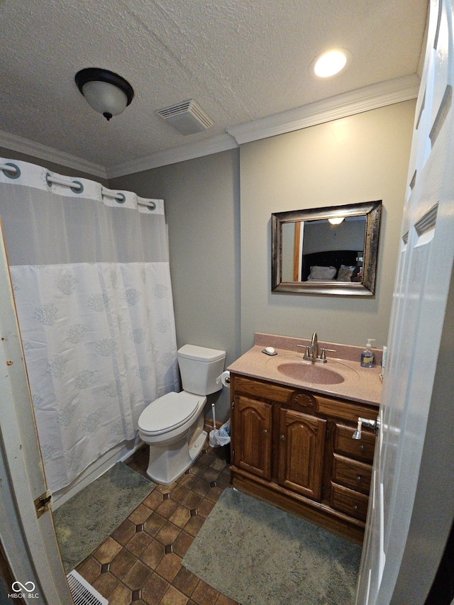 bathroom with toilet, a textured ceiling, visible vents, and crown molding