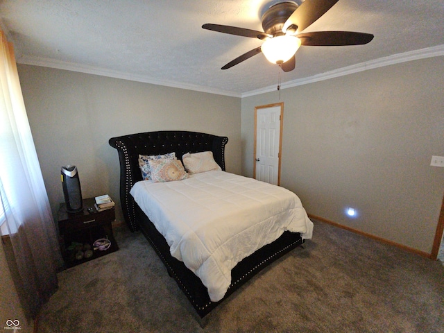 carpeted bedroom with ornamental molding, ceiling fan, and baseboards