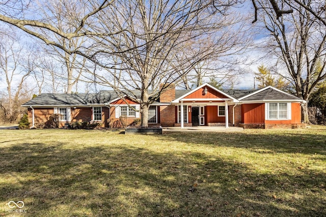 ranch-style house featuring a front lawn