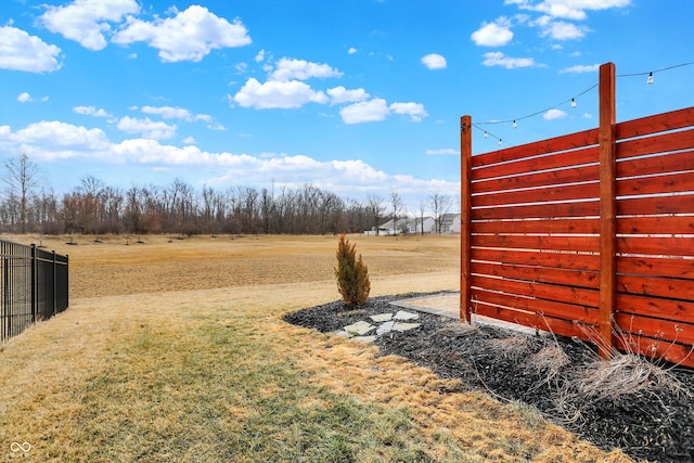 view of yard featuring fence