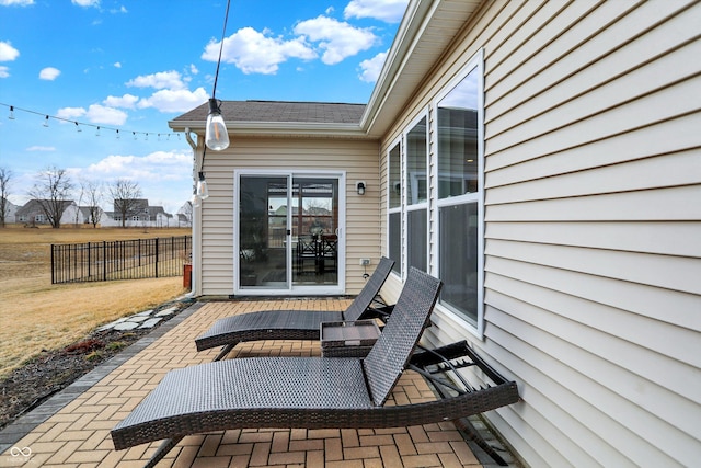 view of patio with fence