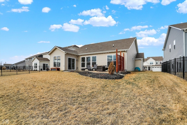 back of house featuring fence, a patio, and a yard