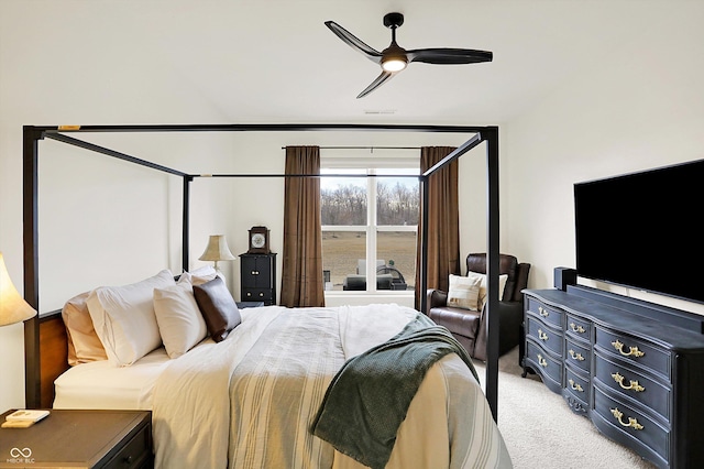 bedroom featuring ceiling fan and light colored carpet