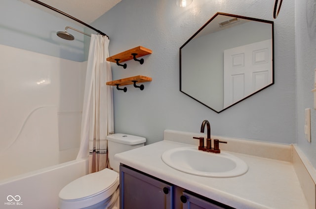 bathroom with vanity, toilet, visible vents, and shower / tub combo with curtain