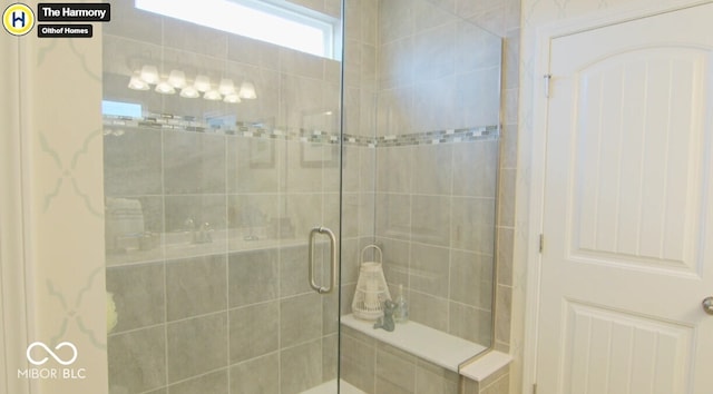 bathroom with tiled shower