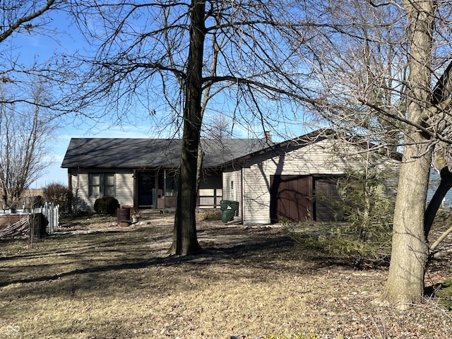 exterior space featuring a chimney