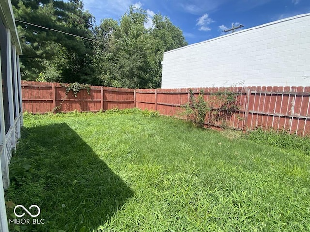 view of yard featuring a fenced backyard