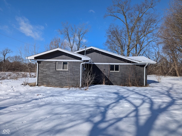 view of snow covered property