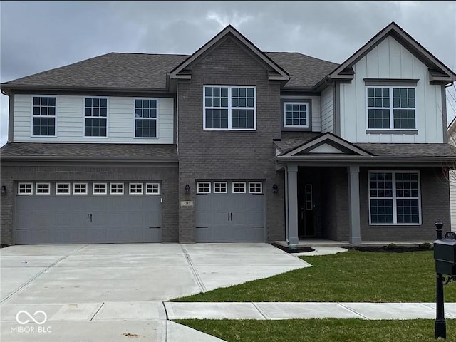 view of front of property with roof with shingles, brick siding, board and batten siding, and an attached garage