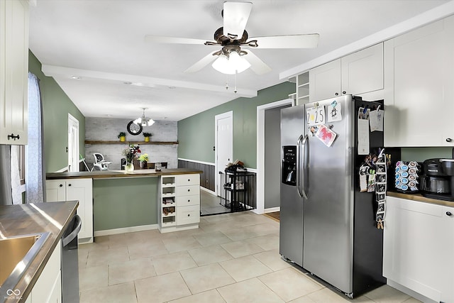 kitchen featuring open shelves, dark countertops, white cabinetry, and stainless steel appliances