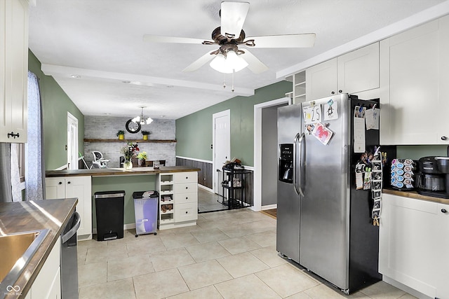 kitchen with open shelves, dark countertops, white cabinets, and stainless steel fridge with ice dispenser