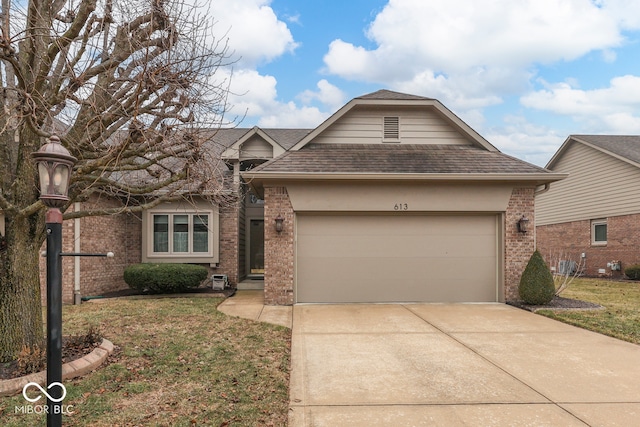 view of front of home featuring an attached garage, brick siding, driveway, roof with shingles, and a front yard