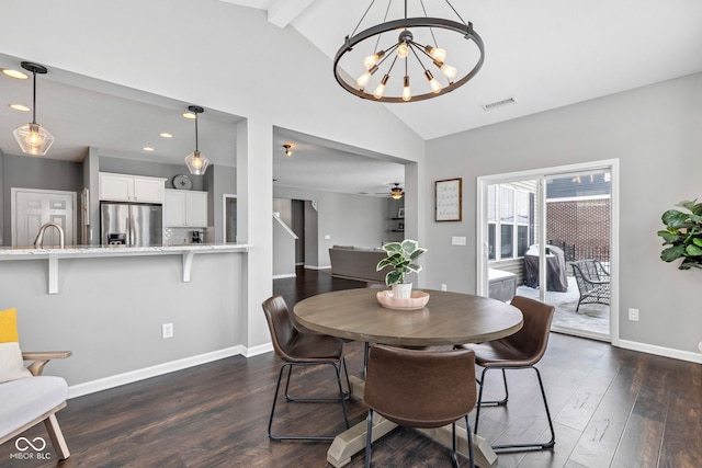 dining room featuring baseboards, visible vents, dark wood-style flooring, ceiling fan with notable chandelier, and recessed lighting