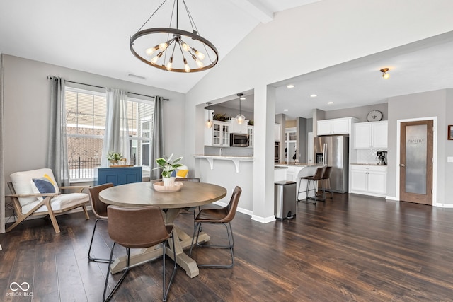 dining area with dark wood-style flooring, visible vents, an inviting chandelier, beamed ceiling, and baseboards