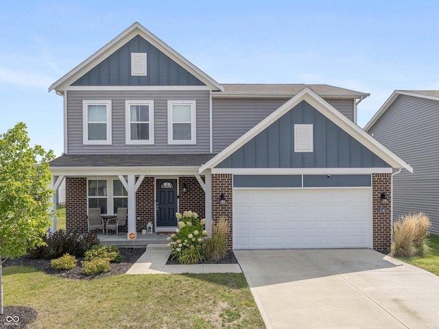 craftsman inspired home featuring board and batten siding, concrete driveway, brick siding, and an attached garage